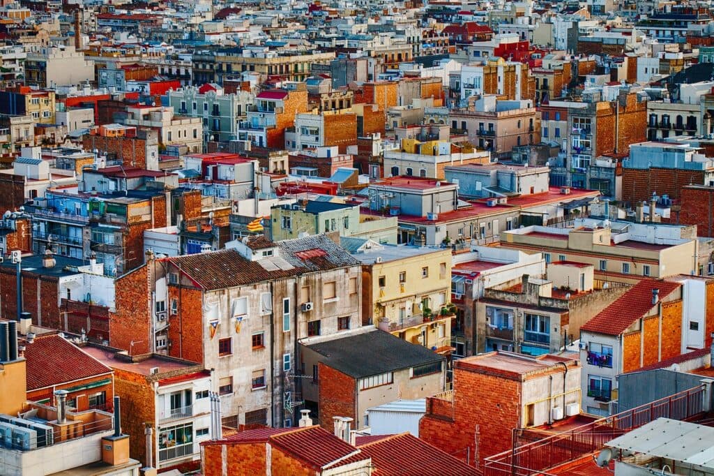 Densely packed rooftops and balconies of a Mediterranean city